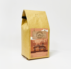 Mustache Ranch Coffee Co. Howdy Roast bag, bold dark roast coffee blend with notes of chocolate and hazelnut.
