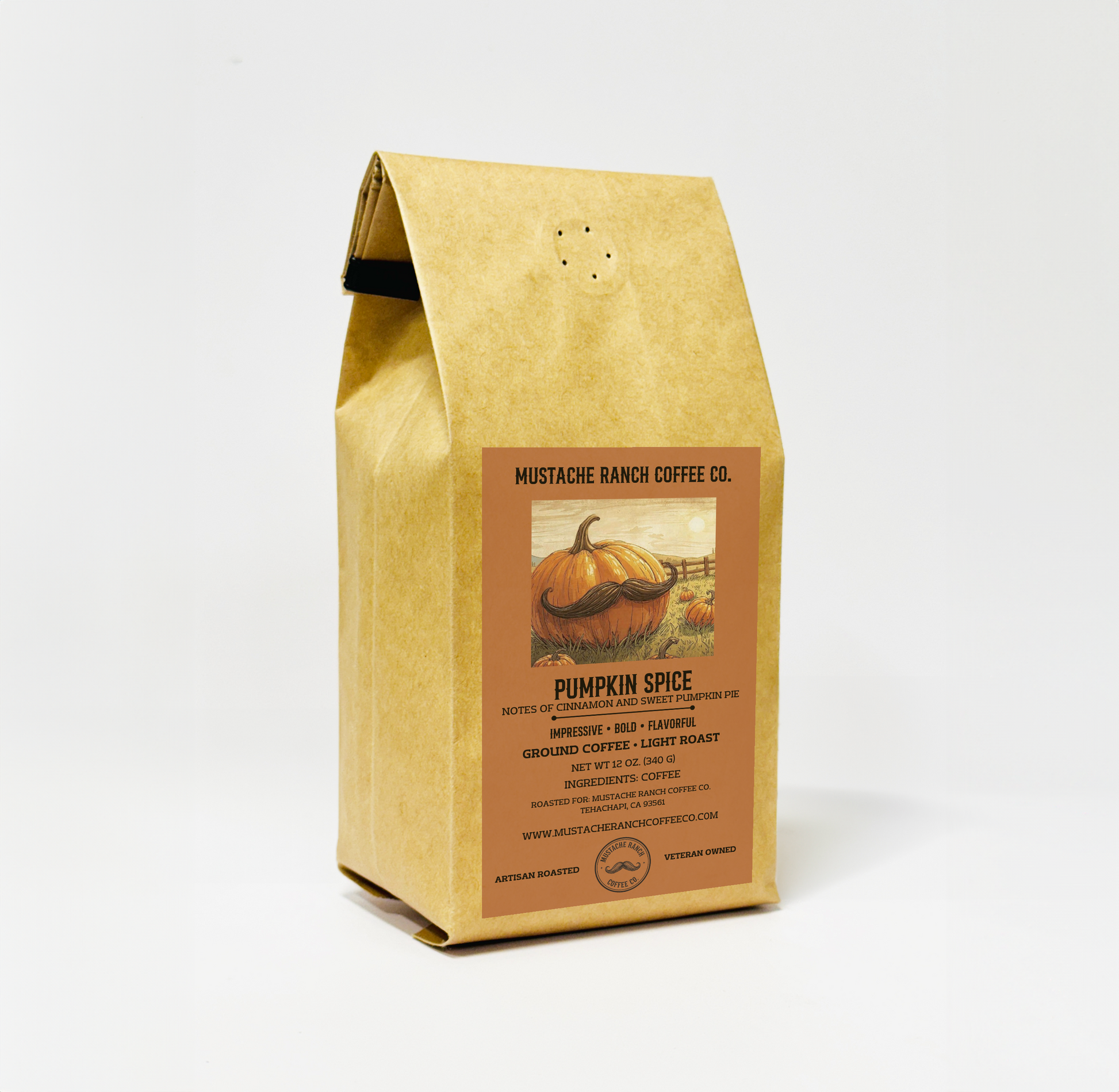Mustache Ranch Coffee Co. Pumpkin Spice medium roast coffee in a kraft paper bag with a seasonal pumpkin illustration and western-style branding on a white background.