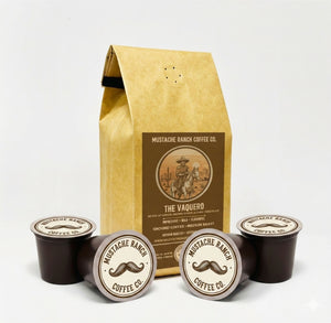 Mustache Ranch Coffee Co. The Vaquero coffee pods alongside a kraft paper coffee bag on a white background, showcasing both packaging formats.